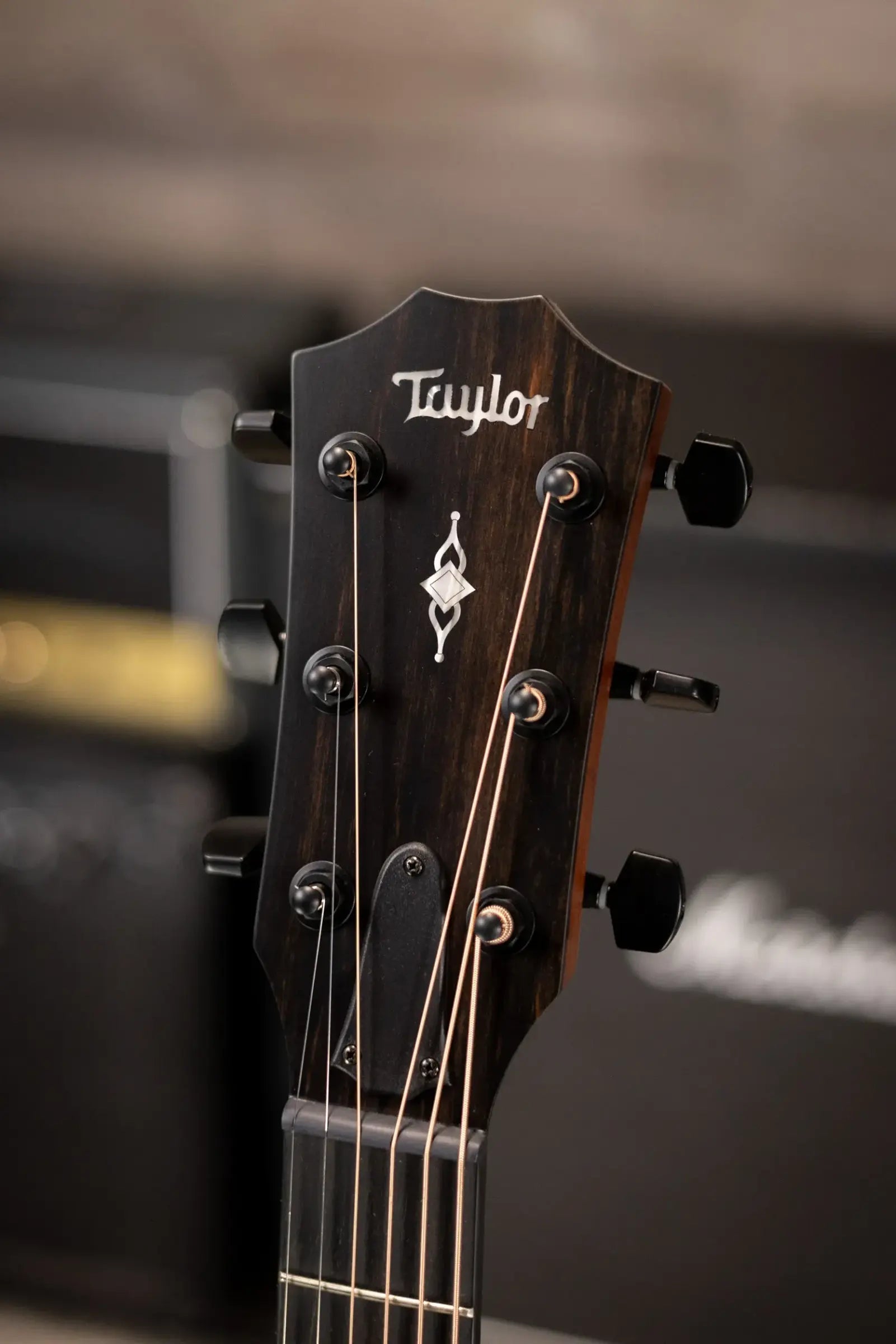 Taylor 324ce Left-Hand Grand Auditorium Acoustic/Electric Guitar - Shaded Edge Burst with Hardshell Case