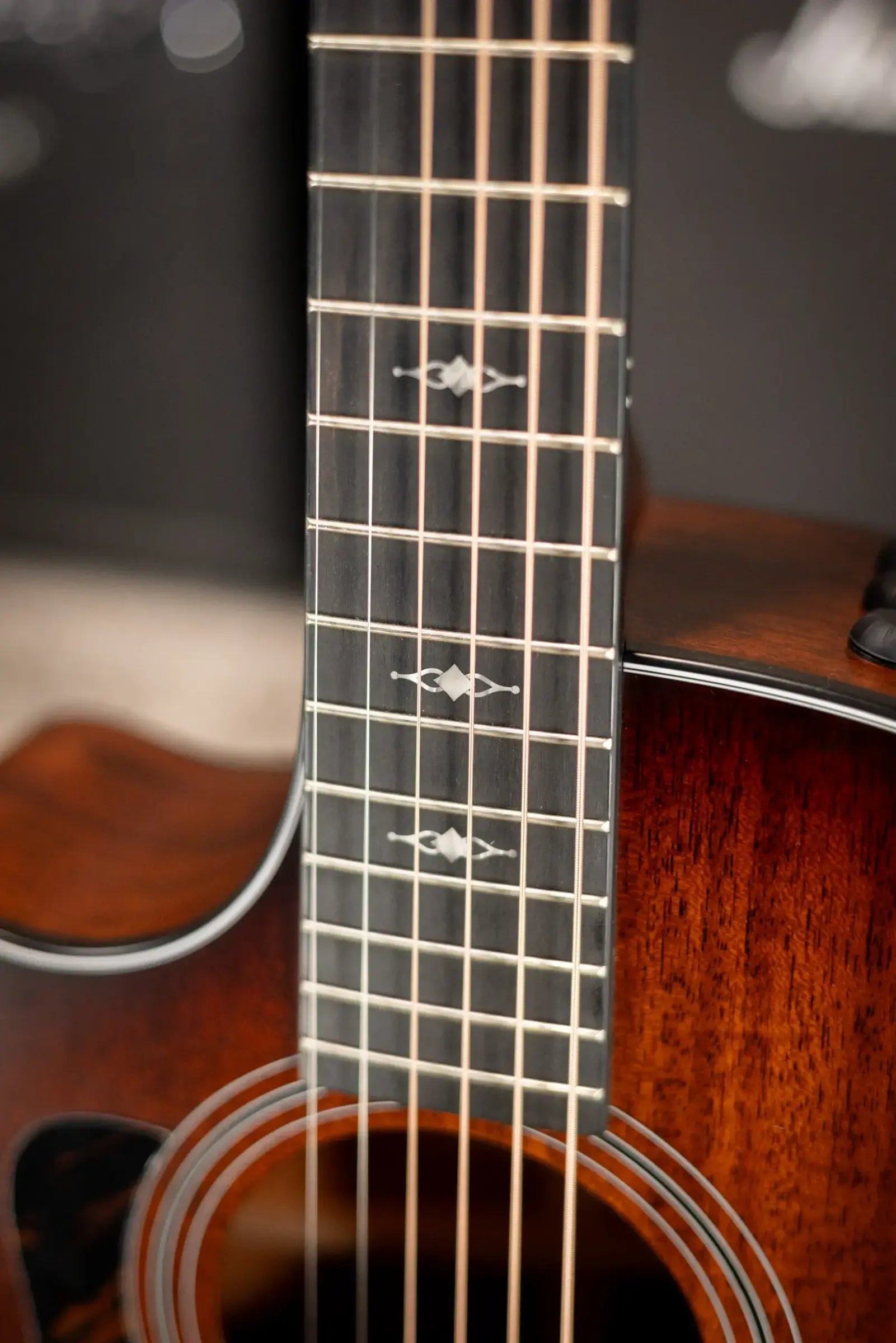 Taylor 324ce Left-Hand Grand Auditorium Acoustic/Electric Guitar - Shaded Edge Burst with Hardshell Case